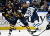 Jeffrey T. Barnes / The Associated Press
Buffalo Sabres forward Evander Kane (9) passes the puck during the first period of an NHL hockey game against the Winnipeg Jets, Tuesday, Jan. 9, 2018, in Buffalo, N.Y.