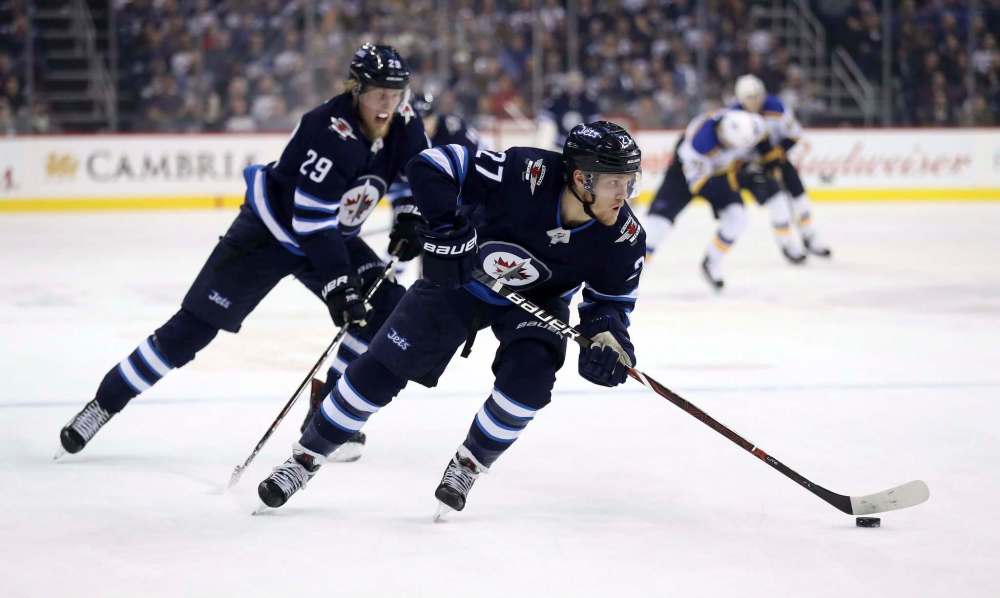 Trevor Hagan / The Canadian Press FILES
Winnipeg Jets snipers Patrik Laine (left) and Nikolaj Ehlers are tied for the team goal-scoring lead, each with 19 so far this season.