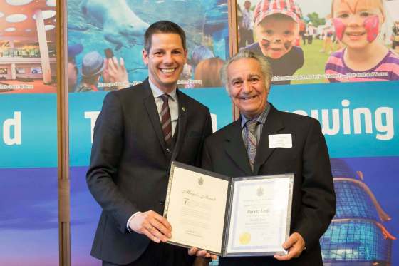 SUPPLIEDMayor Brian Bowman (left) presents the Mayor’s BIZ Award to Parviz Lotfi in 2015.