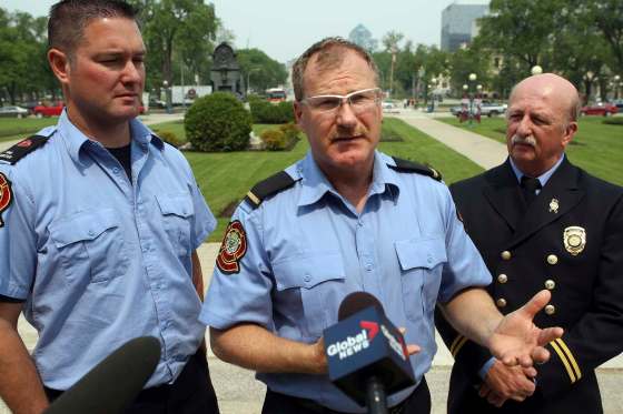 BORIS MINKEVICH/WINNIPEG FREE PRESS FILESThe City of Winnipeg has paid firefighter union president Alex Forrest (centre) $1.2 million over a 17-year period.