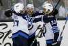 (AP Photo/Marcio Jose Sanchez)
Winnipeg Jets' Bryan Little, centre, celebrates his overtime goal with teammates Nik Ehlers and Dustin Byfuglien, in their game against the San Jose Sharks on Tuesday, in San Jose, Calif. Winnipeg won 5-4.