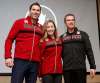 From left, John Morris, Kaitlyn Lawes and coach Jeff Stoughton receive their Team Canada jackets earlier this month in Winnipeg. (John Woods / Canadian Press files)