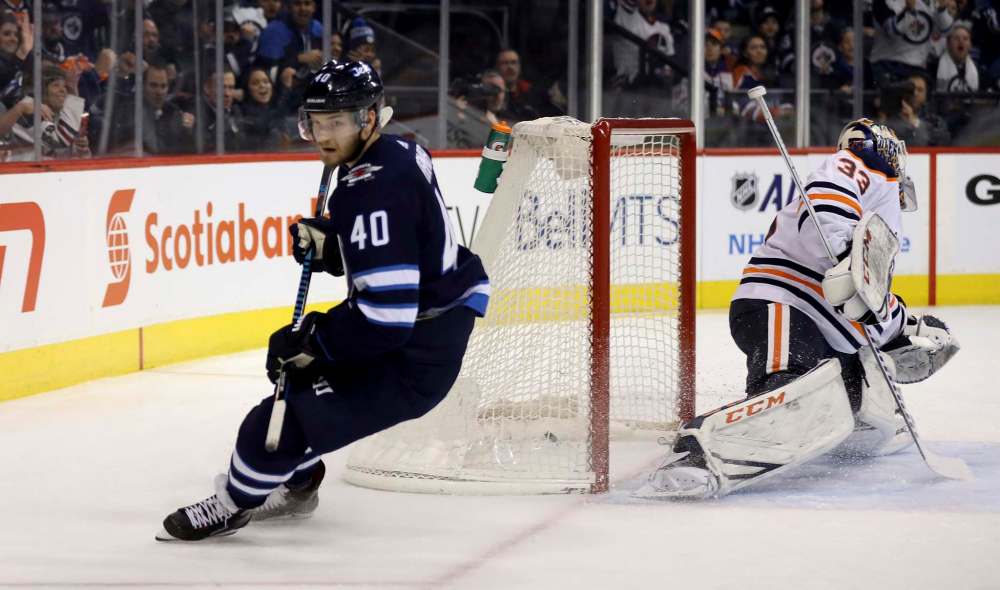 TREVOR HAGAN / WINNIPEG FREE PRESS FILES
Winnipeg Jets' Joel Armia (40) scores on Edmonton Oilers' goaltender Cam Talbot (33) during second period NHL hockey action, Wednesday, December 27, 2017. The Jets are expected to play in Armia's home country of Finland next year.