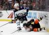 (AP Photo/Jae C. Hong)
Anaheim Ducks' Ondrej Kase, bottom, of the Czech Republic, falls as Winnipeg Jets' Joel Armia, of Finland, moves the puck during the second period of an NHL hockey game Thursday, Jan. 25, 2018, in Anaheim, Calif.