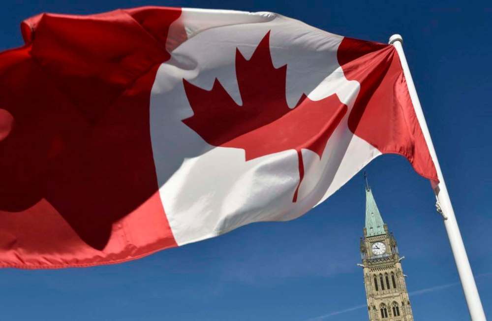 Justin Tang / The Canadian Press Files
The Canadian flag on Parliament Hill — almost as sexy as the sound of our voices, eh?