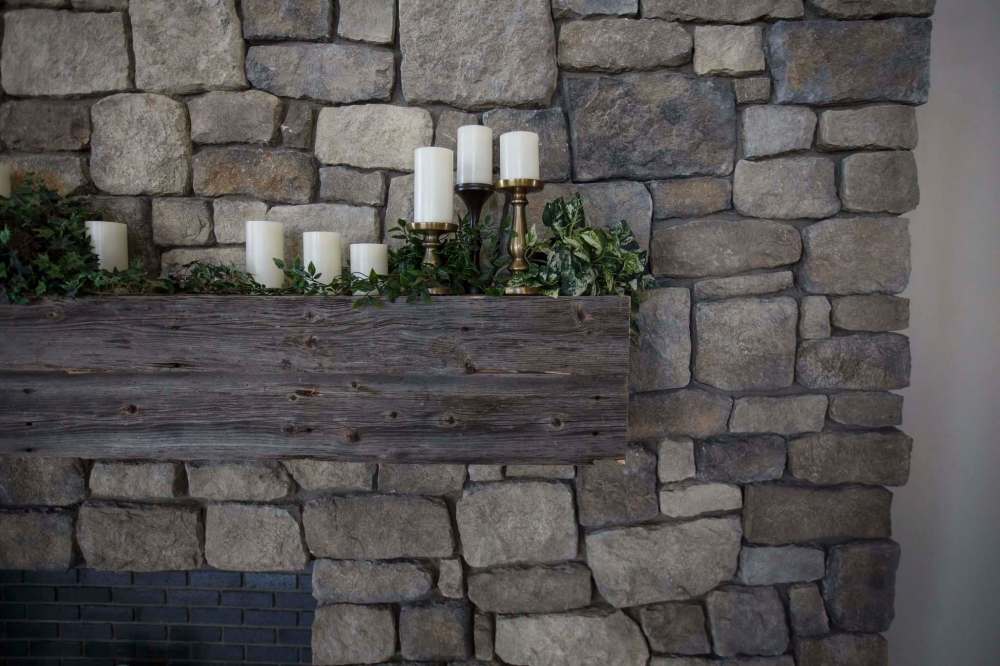 MIKE DEAL / WINNIPEG FREE PRESS
The new venue features massive six-by-six posts in the railings, a huge stone fireplace (left) at one end of the space and an oversized armoire bound for the groom's loft.