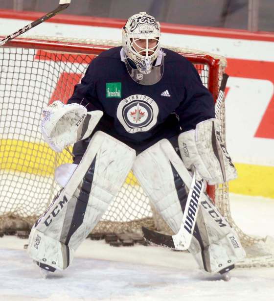 BORIS MINKEVICH / WINNIPEG FREE PRESS FILESMichael Hutchinson makes his first start for the Jets this season tonight. He is coming off an appearance at the AHL all-star game on Monday.