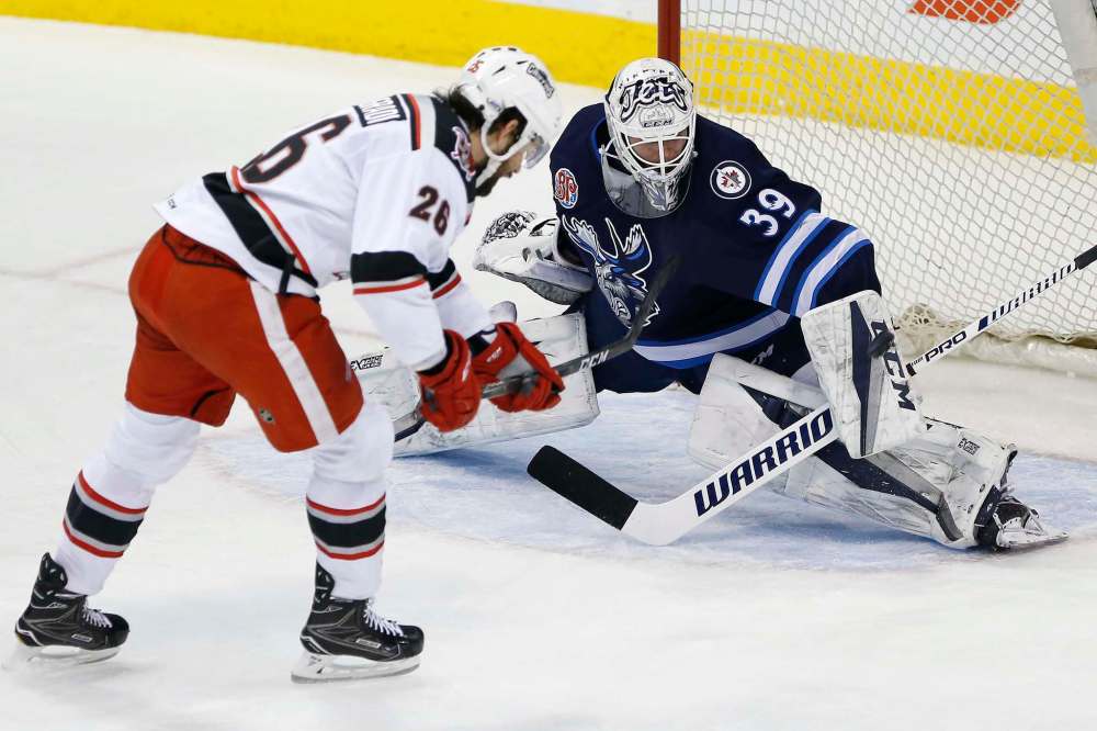 JOHN WOODS / WINNIPEG FREE PRESS FILES
Michael Hutchinson has been one of the AHL’s best goalies this season with a 15-2-4 record, 1.95 goals-against average and .942 save percentage. He'll get his first NHL start of the season tonight against the league's top team, the Tampa Bay Lightning.
