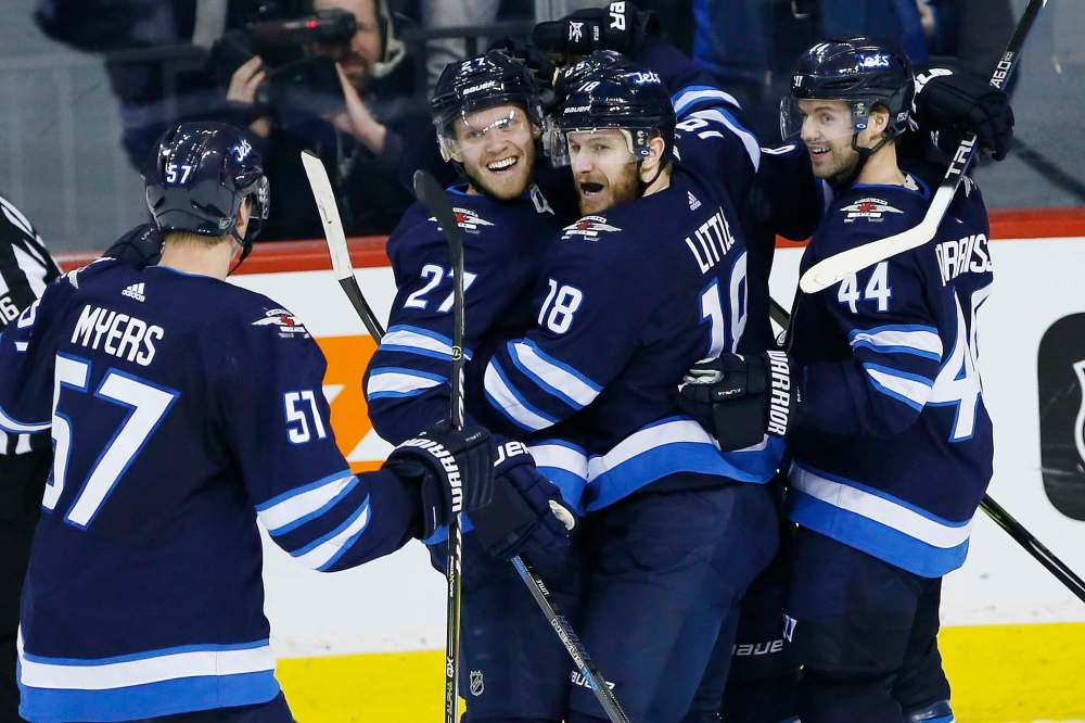 JOHN WOODS / WINNIPEG FREE PRESS
Winnipeg Jets' Tyler Myers, Nikolaj Ehlers, Bryan Little, Mathieu Perreault and Josh Morrissey celebrate Little's goal against the Tampa Bay Lightning during third period NHL action in Winnipeg on Tuesday, January 30, 2018. The Jets defeated the top team in the NHL 3-1.