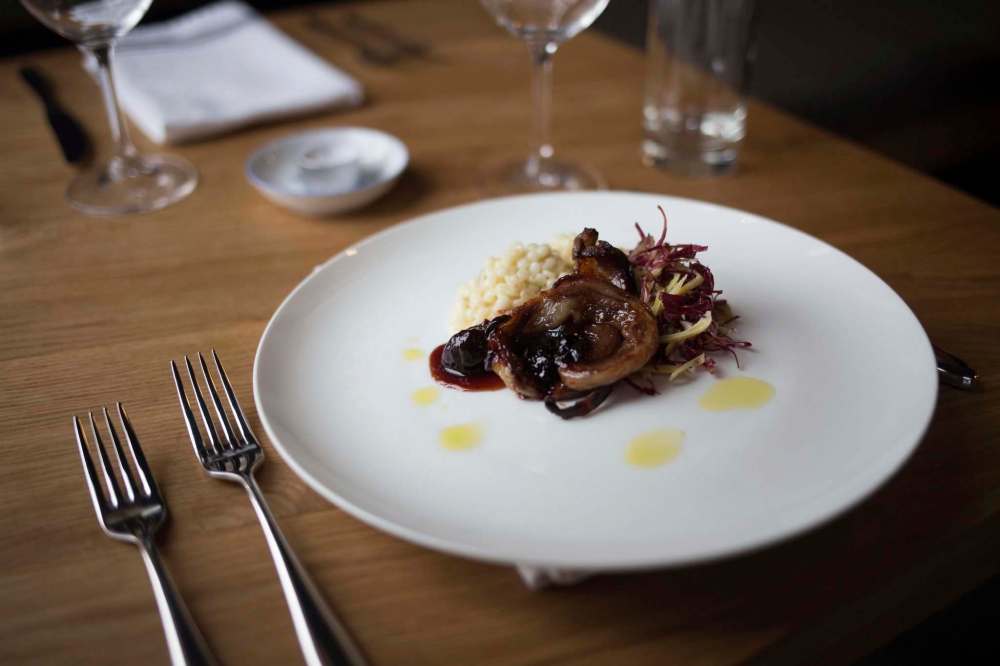 JEN DOERKSEN / WINNIPEG FREE PRESS
The Oxbow’s smoked lamb belly in a sour cherry gastrique, with an artichoke and radicchio chiffonade and Israeli couscous with a lemon crreme sauce. The restaurant opened at 557 Osborne St in early January.