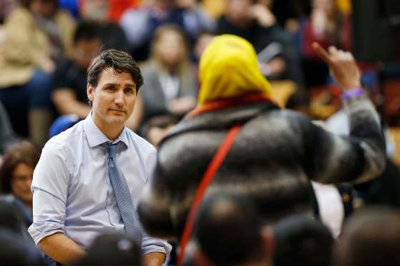 JOHN WOODS / THE CANADIAN PRESSPrime Minister Justin Trudeau listens to a question about Child and Family Services at a town hall meeting at the University of Manitoba in Winnipeg, Wednesday, January 31, 2018.