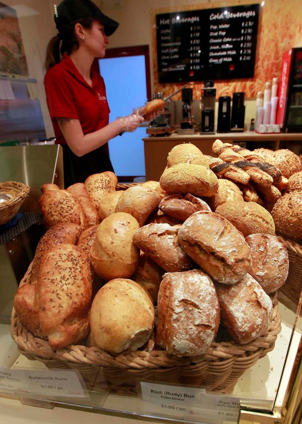 Erin Kennedy makes a sandwich with some fresh buns baked on site.