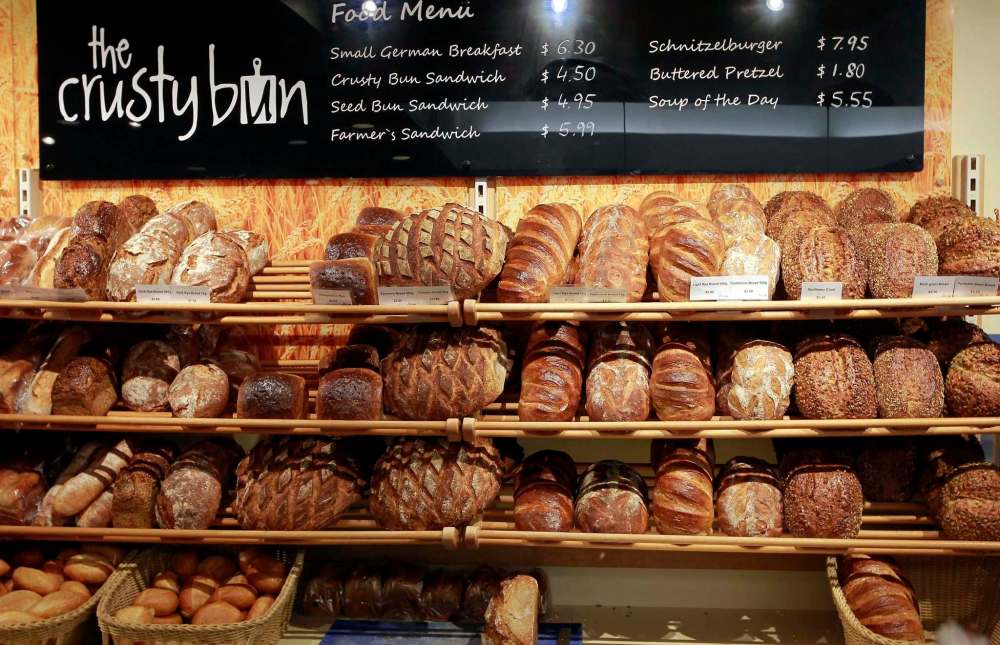 Customers are met by a wide selection of fresh baked bread to choose from.