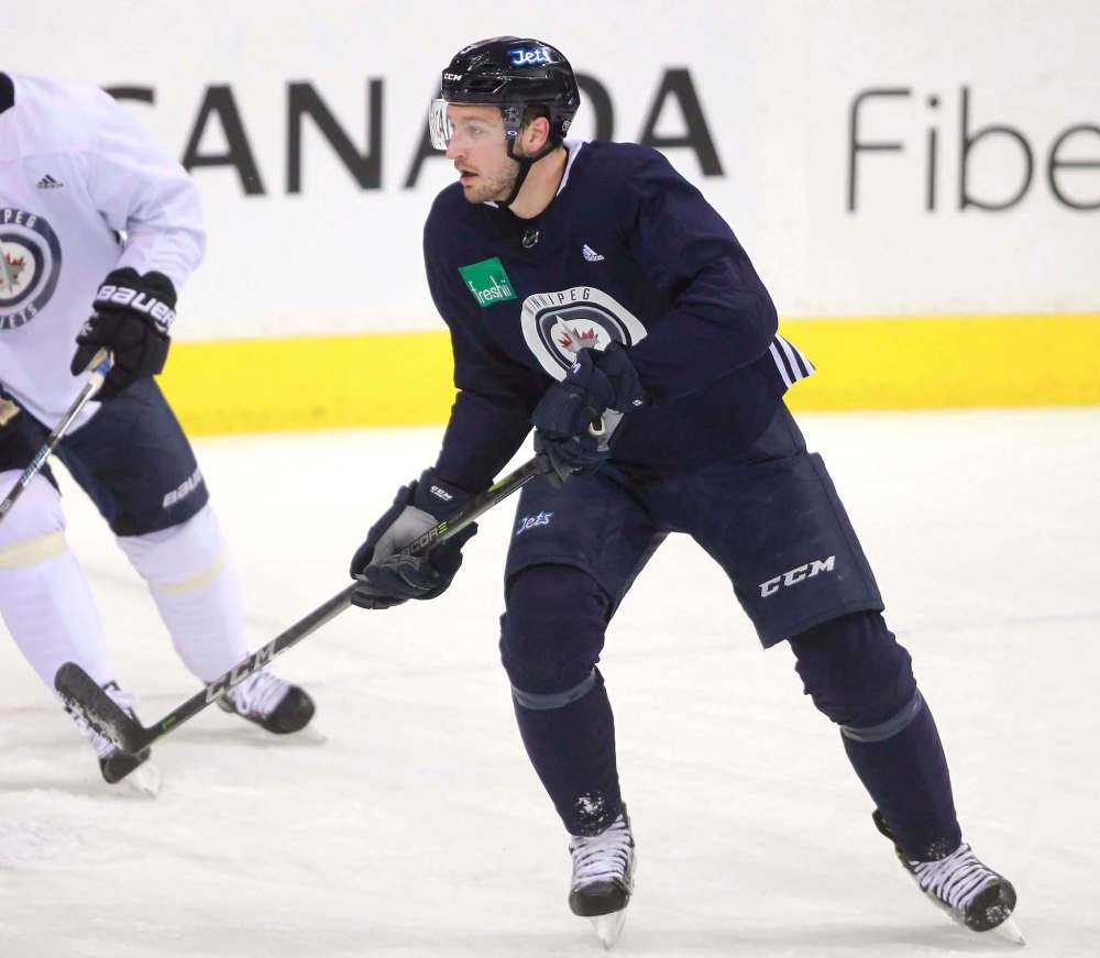 BORIS MINKEVICH / WINNIPEG FREE PRESS
Rookie defenceman Tucker Poolman could be moved to forward on an emergency basis if needed. He played some forward in college.