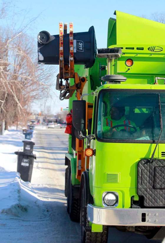 BORIS MINKEVICH / WINNIPEG FREE PRESSA GFL truck works in the Bright Oaks area.