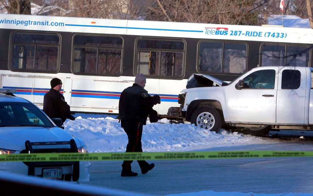 Driver charged after truck, bus collide Winnipeg Free Press