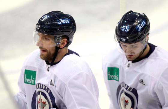 BORIS MINKEVICH / WINNIPEG FREE PRESSBlake Wheeler and Mark Scheifele at practice today at MTS Bell Place. Mark Scheifele may return to the Winnipeg Jets lineup Friday night.