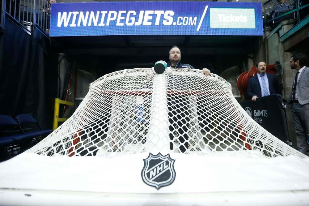 Paul Lazarenko waits to move the net.