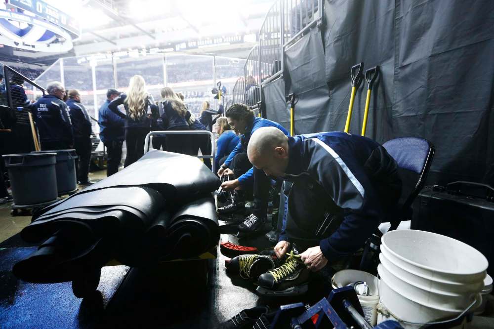 Doug Arnold is superstitious so he waits until after the anthem to lace up.