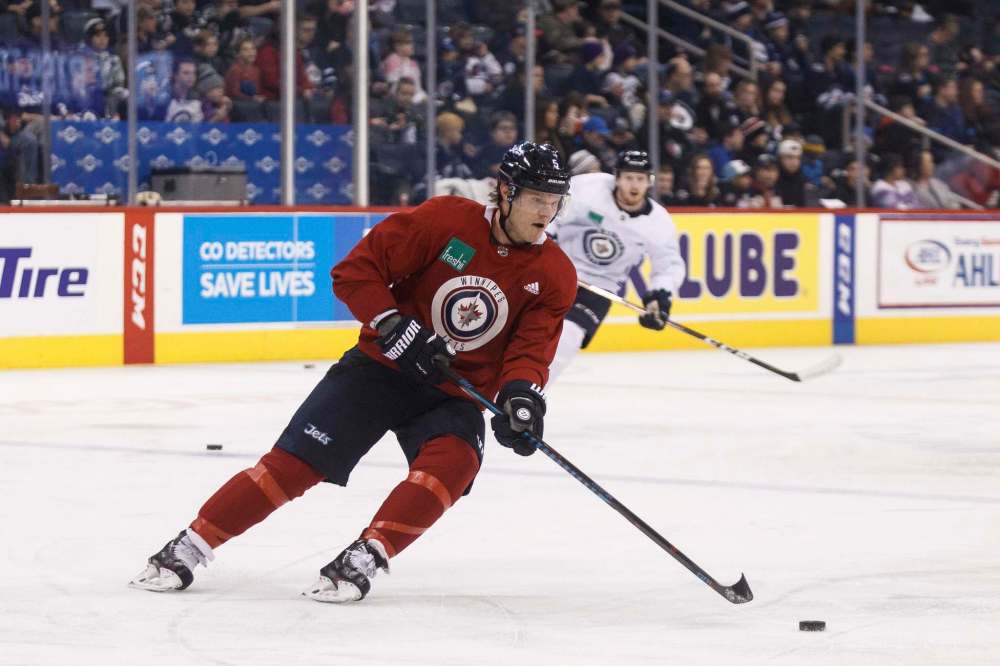 MIKE DEAL / WINNIPEG FREE PRESS FILES
Winnipeg Jets' Dmitry Kulikov (5) during practice at Bell MTS Place.