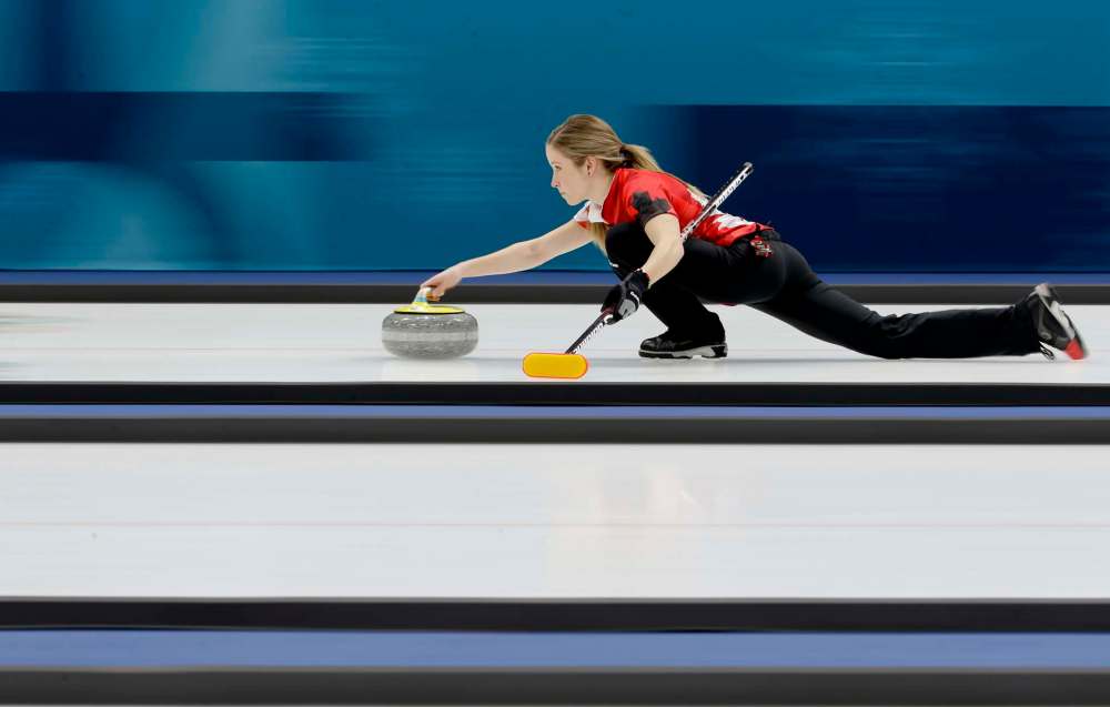 NATACHA PISARENKO / THE ASSOCIATED PRESS
Canada's Kaitlyn Lawes throws a stone during a mixed doubles curling match against South Korea's Jang Hyeji and Lee Kijeong at the 2018 Winter Olympics in Gangneung, South Korea, Sunday, Feb. 11, 2018.