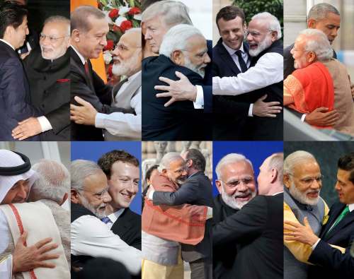 The Associated Press files
In this combo photo, Indian Prime Minister Narendra Modi is seen hugging various heads of state and VIPs.