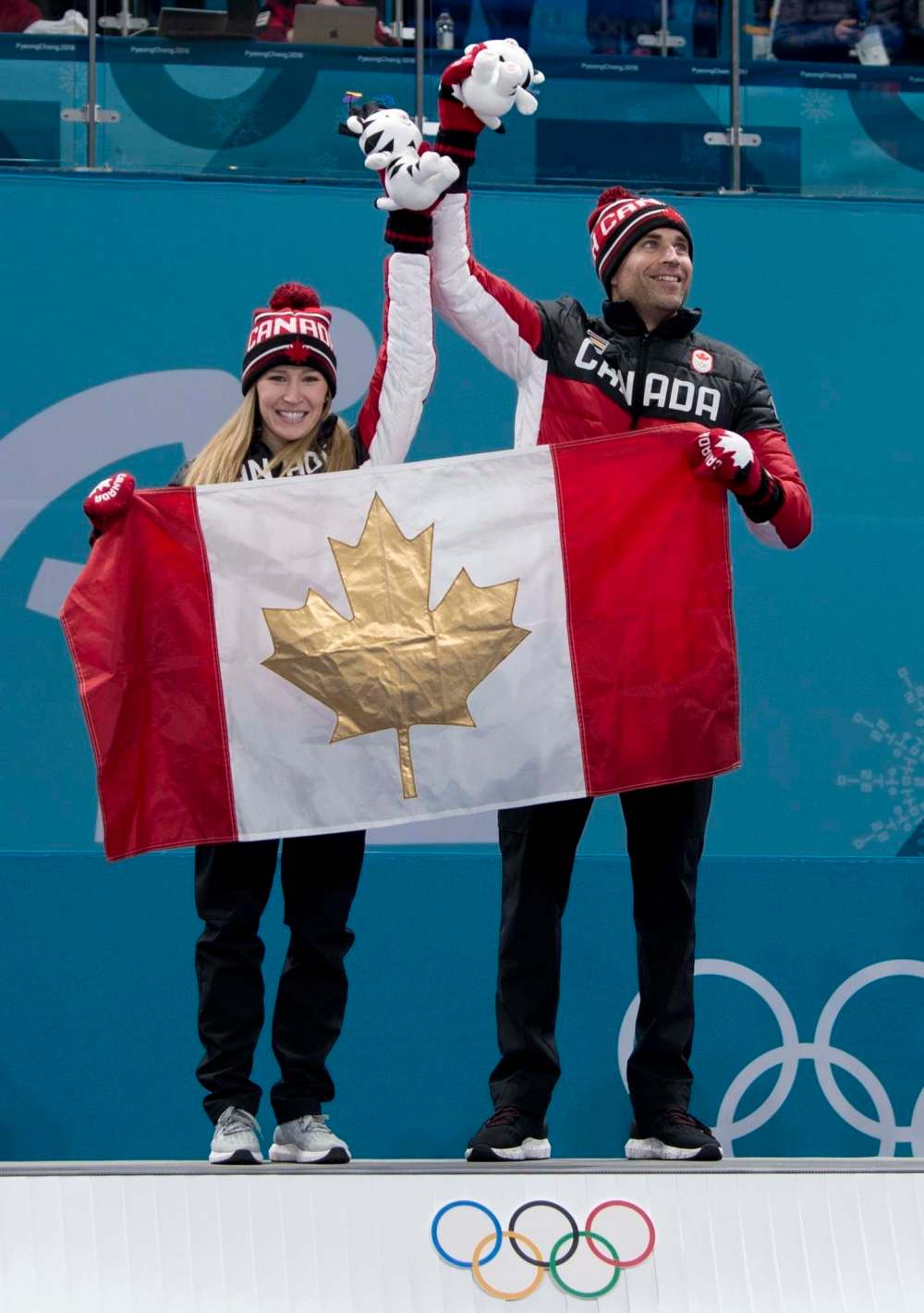With the win, Lawes and Morris became the first ever curlers from Canada to win two gold medals. (Michael Burns / The Canadian Press)
