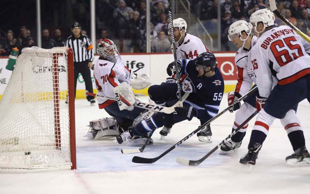 THE CANADIAN PRESS/Trevor Hagan
Winnipeg Jets' Mark Scheifele scores on Washington Capitals' goaltender Braden Holtby during the first period, Tuesday.
