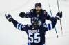 JOHN WOODS / WINNIPEG FREE PRESS Winnipeg Jets' Mathieu Perreault (85) and Mark Scheifele (55) celebrate Scheifele's game tying goal against the Washington Capitals during third period NHL action in Winnipeg on Tuesday, February 13, 2018.