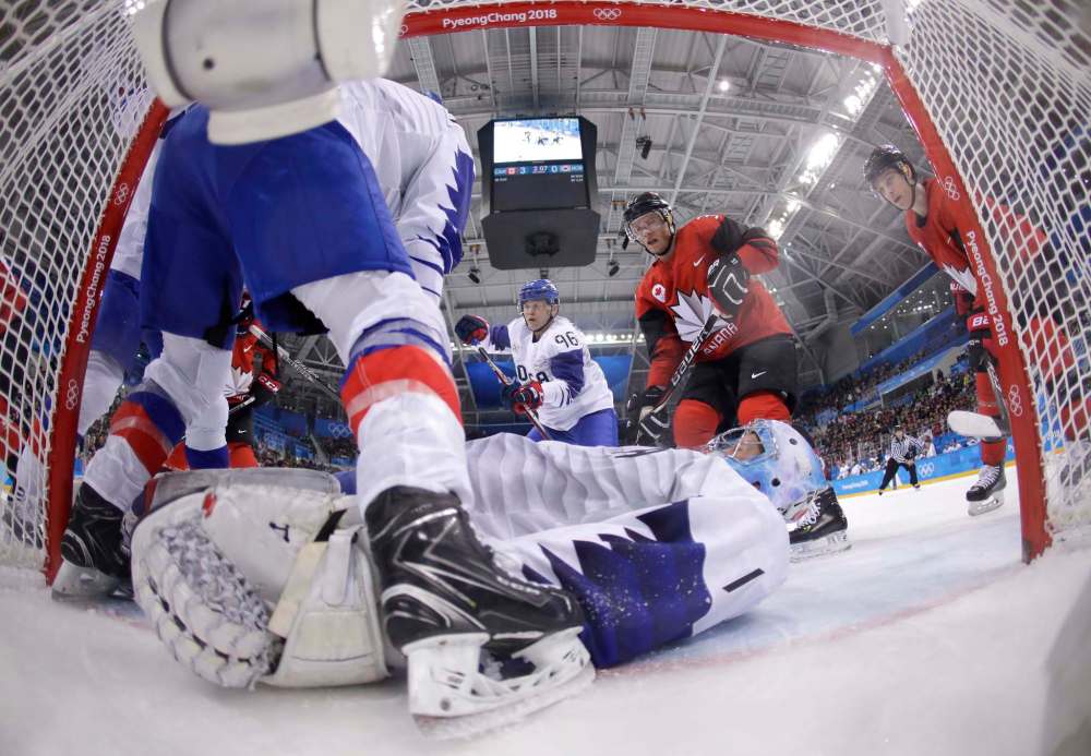 Julio Cortez / The Associated Press
Goalie Matt Dalton (1), of South Korea, lays out to stop the puck during the third period of the preliminary round of the men's hockey game against Canada at the 2018 Winter Olympics in Gangneung, South Korea, Sunday, Feb. 18, 2018.