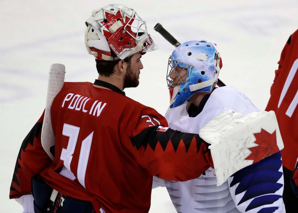Matt Slocum / The Associated Press
Kevin Poulin (31), of Canada, greets Matt Dalton (1), of South Korea, after the preliminary round of the men's hockey game at the 2018 Winter Olympics in Gangneung, South Korea, Sunday, Feb. 18, 2018. Canada won 4-0.
