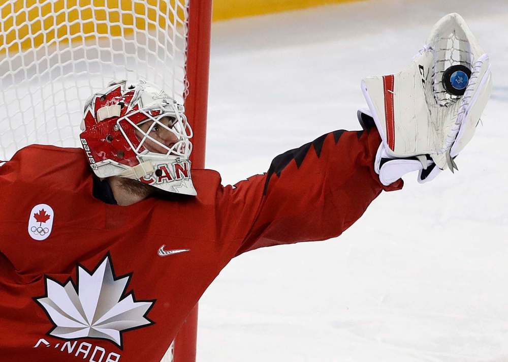 Matt Slocum / The Associated Press
Goalie Kevin Poulin (31), of Canada, grabs the puck during the third period of the preliminary round of the men's hockey game against South Korea at the 2018 Winter Olympics in Gangneung, South Korea, Sunday, Feb. 18, 2018.