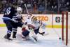TREVOR HAGAN / THE CANADIAN PRESS
A shot by Winnipeg Jets left wing Nikolaj Ehlers (not shown) gets past Florida Panthers goaltender James Reimer (34) with Jets right wing Patrik Laine (29) and Panthers defenceman MacKenzie Weegar (52) in front of the net during second period NHL hockey action in Winnipeg, Sunday, February 18, 2018.