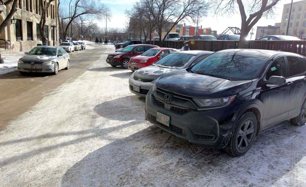 BORIS MINKEVICH / WINNIPEG FREE PRESS
Back-in angle parking on Bannatyne Avenue between Rorie Street and Waterfront Drive.