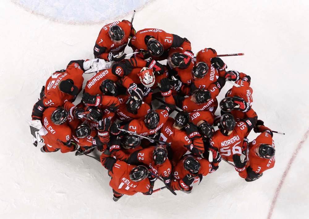 Canada players celebrate after the quarterfinal round of the men's hockey game against Finland at the 2018 Winter Olympics in Gangneung, South Korea, Wednesday, Feb. 21, 2018. Canada won 1-0. (AP Photo/Matt Slocum)
