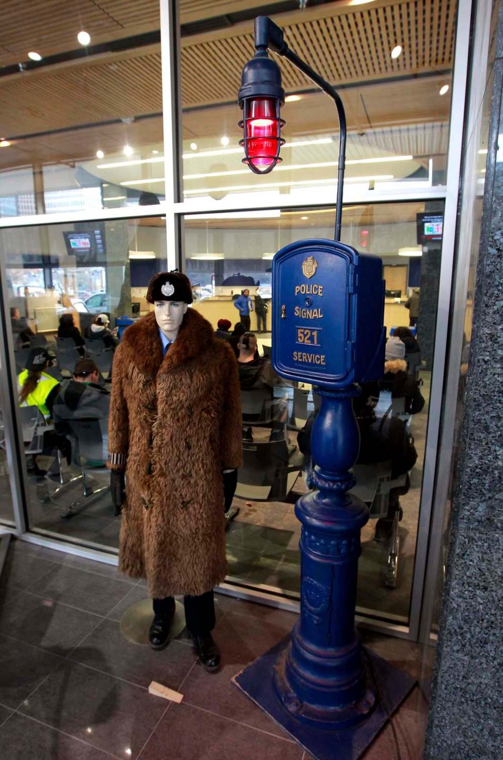 BORIS MINKEVICH / WINNIPEG FREE PRESS
A buffalo coat and the historic police signal box are among items from policing’s past at the Winnipeg Police Museum.