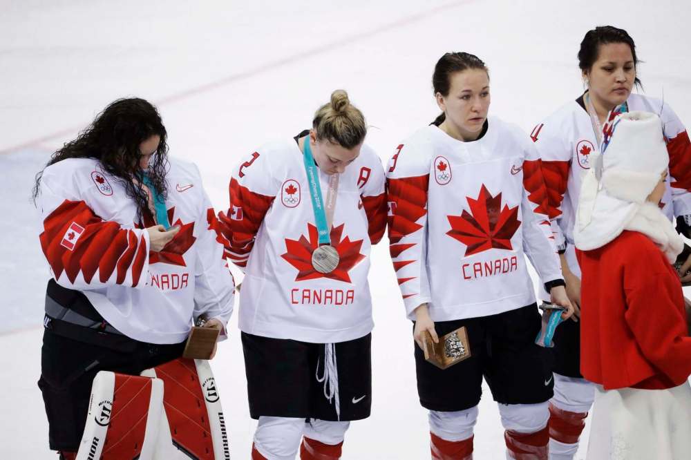 Matt Slocum / The Associated Press
Jocelyne Larocque, (3), of Canada, holds her silver medal after losing to the United States in the women’s gold medal hockey game at the 2018 Winter Olympics in Gangneung, South Korea, Thursday.