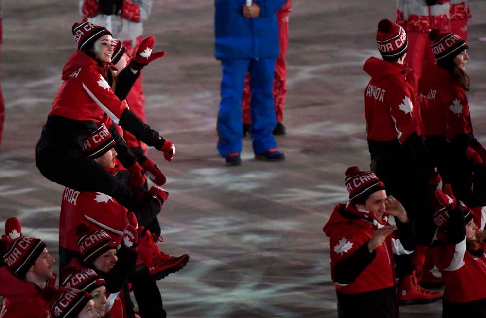 Nathan Denette / The Canadian Press
Canada did not figure into the medals on the final day of competition at the 2018 Pyeongchang Olympics, but its athletes were all smiles Sunday as they marched in the closing ceremony en masse to the country's best-ever showing at a Winter Games. Figure skater Kaetlyn Osmond rides the shoulders of a teammate as Canadian athletes walk into the Olympic stadium during the closing ceremonies at the 2018 Pyeongchang Olympic Winter Games in Pyeongchang, South Korea, on Sunday, February 25, 2018.