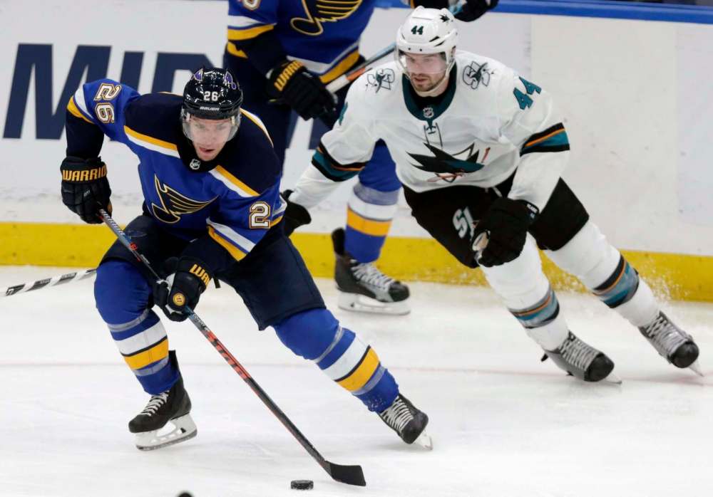 Tom Gannam / The Associated Press files
St. Louis Blues' Paul Stastny, left, controls the puck in front of San Jose Sharks' Marc-Edouard Vlasic during the third period of an NHL hockey game Tuesday, Feb. 20, 2018, in St. Louis. The Sharks beat the Blues 3-2.