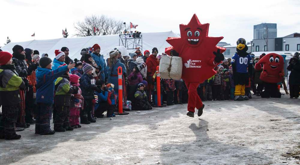 MIKE DEAL / WINNIPEG FREE PRESS
Local mascots took part in a race for the kids during the Festival du Voyageur in Fort Gibraltar. Many people complained about long lines at the festival Saturday night.