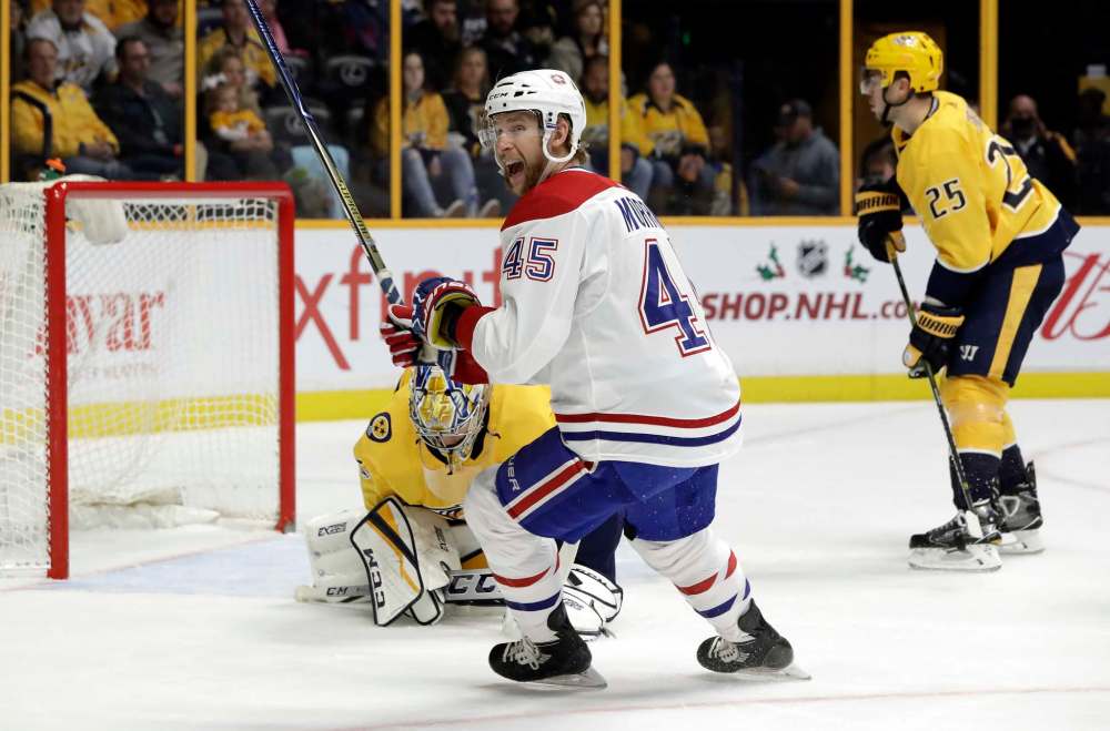 (AP Photo/Mark Humphrey)
Montreal Canadiens defenseman Joe Morrow celebrates after teammate Jordie Benn, not seen, scored against Nashville Predators goalie Pekka Rinne in 2017. Morrow was traded at the deadline to the Winnipeg Jets from the Montreal Canadiens for a 2018 fourth-round draft pick.