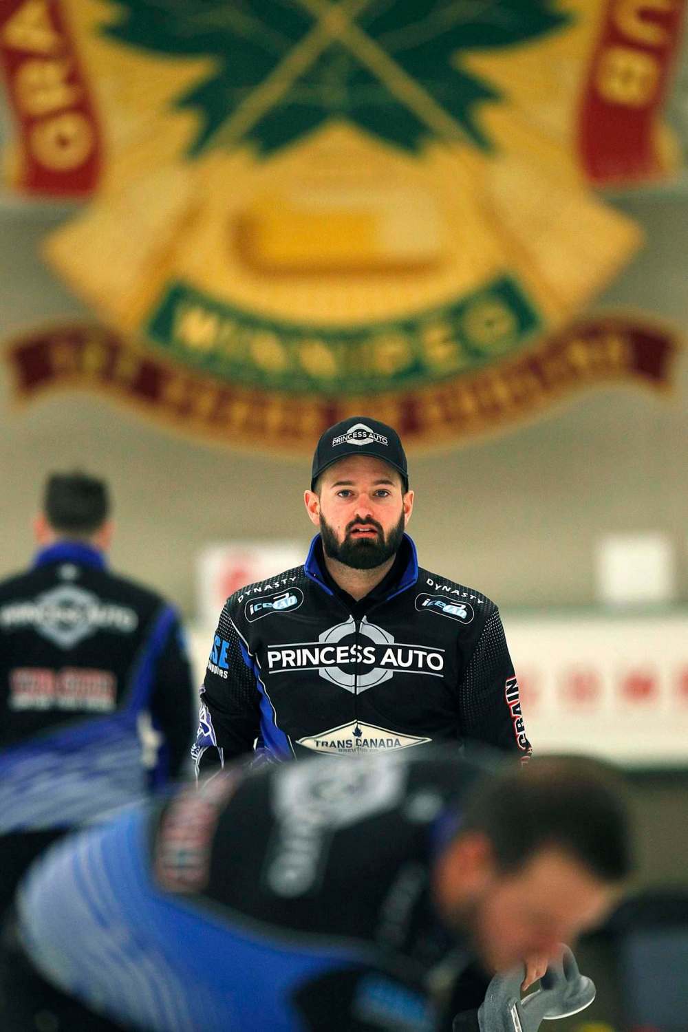 PHIL HOSSACK / WINNIPEG FREE PRESS - TEAM CARRUTHERS - Ried Carruthers watches team mates sweep down ice during a practice session at the Granit CC Tuesday afternoon. See Jay Bell's story. - February 27, 2018