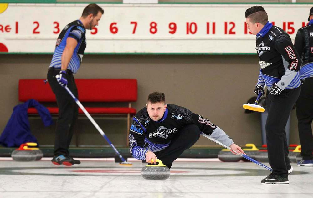 PHIL HOSSACK / WINNIPEG FREE PRESS - TEAM CARRUTHERS - Carruthers Third, Braeden Moskowy delivers between Derek Samagalski and Colin Hodgson at a practice session at the Granit CC Tuesday afternoon. See Jay Bell's story. - February 27, 2018