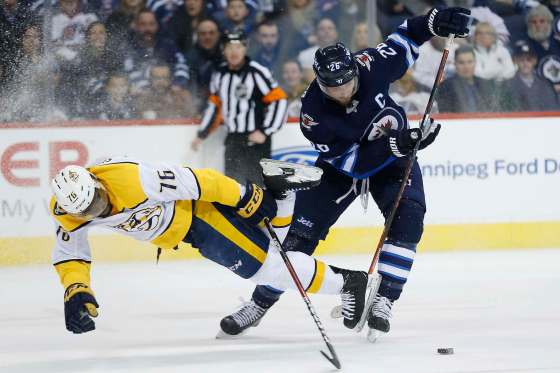 JOHN WOODS / WINNIPEG FREE PRESSWinnipeg Jets' Blake Wheeler blasts past Nashville Predators' P.K. Subban during second period NHL action in Winnipeg, Tuesday.