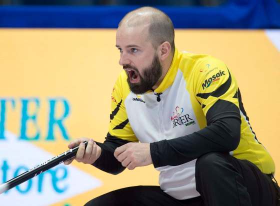 THE CANADIAN PRESS/Andrew VaughanManitoba skip Reid Carruthers directs the sweep as they play Quebec at the Tim Hortons Brier curling championship at the Brandt Centre in Regina on Monday, March 5, 2018.
