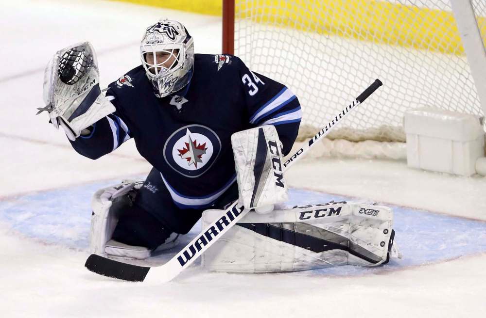 Trevor Hagan / The Canadian Press
Winnipeg Jets goaltender Michael Hutchinson had to make his way from Wisconsin to New Jersey Thursday as an emergency backup to Connor Hellebuyck.