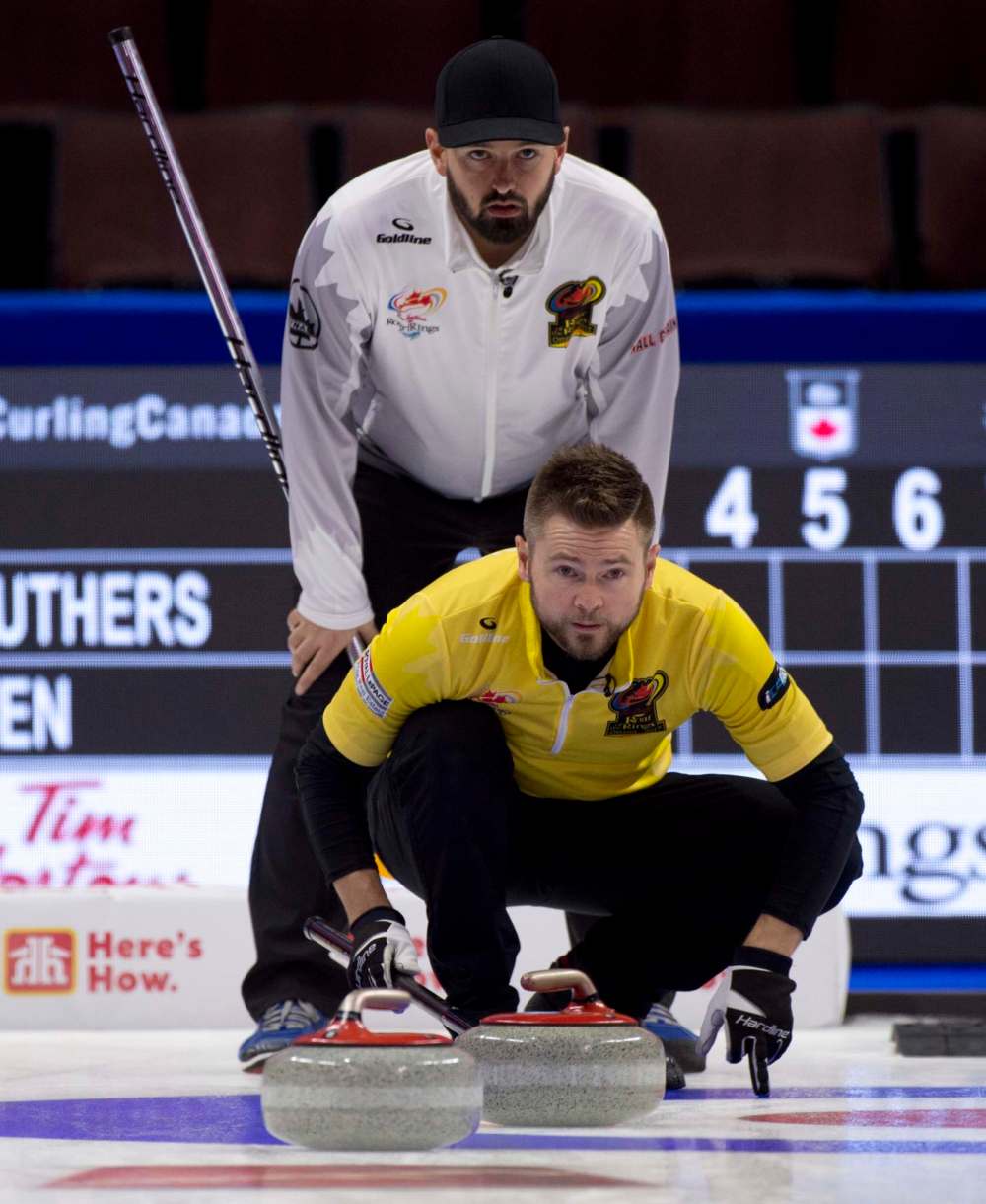 Michael Burns / Winnipeg Free Press Files
Team Manitoba skip Reid Carruthers, back, and Team Wild Card skip Mike McEwen will face each other Friday night with McEwen needing a victory just for a chance to get into the final four this weekend.
