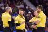 Skip Mike McEwen of Winnipeg, Man. talks with third B.J. Neufeld, left, second Matt Wozniak, second from right, and lead Denni Neufeld between ends during the men's semifinal at the 2017 Roar of the Rings Canadian Olympic Trials in Ottawa on Saturday, Dec. 9, 2017. THE CANADIAN PRESS/Justin Tang