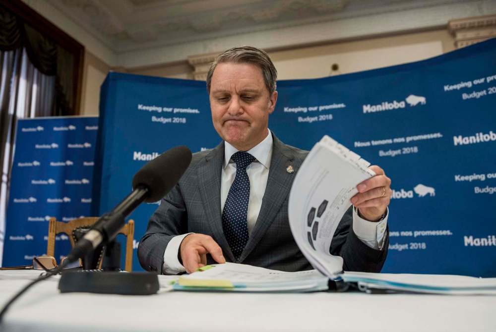 David Lipnowski / The Canadian Press
Finance Minister Cameron Friesen speaks about the 2018 budget during the media lockup at the Manitoba legislature on Monday.