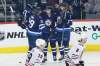 THE CANADIAN PRESS/John Woods
Winnipeg Jets forwards Nikolaj Ehlers, Patrik Laine, Paul Stastny and defenceman Ben Chiarot celebrate Stastny's goal against the Chicago Blackhawks during first period in Winnipeg on Thursday.